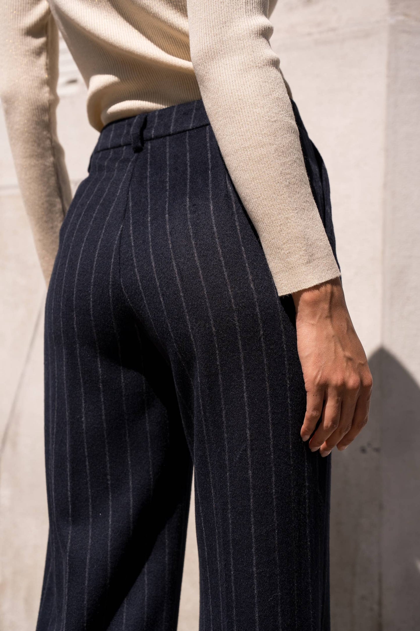 Pinstripe wool-blend trousers