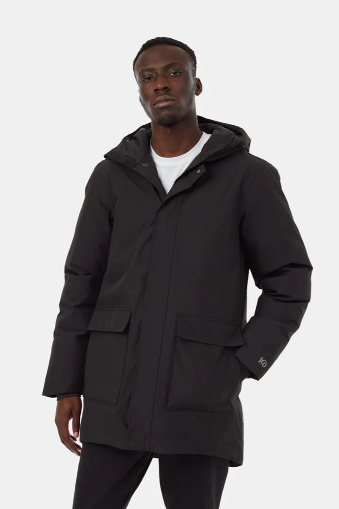 Man wearing a black hooded jacket on a white background