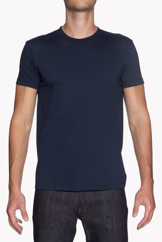 Person wearing a navy blue t-shirt on a white background