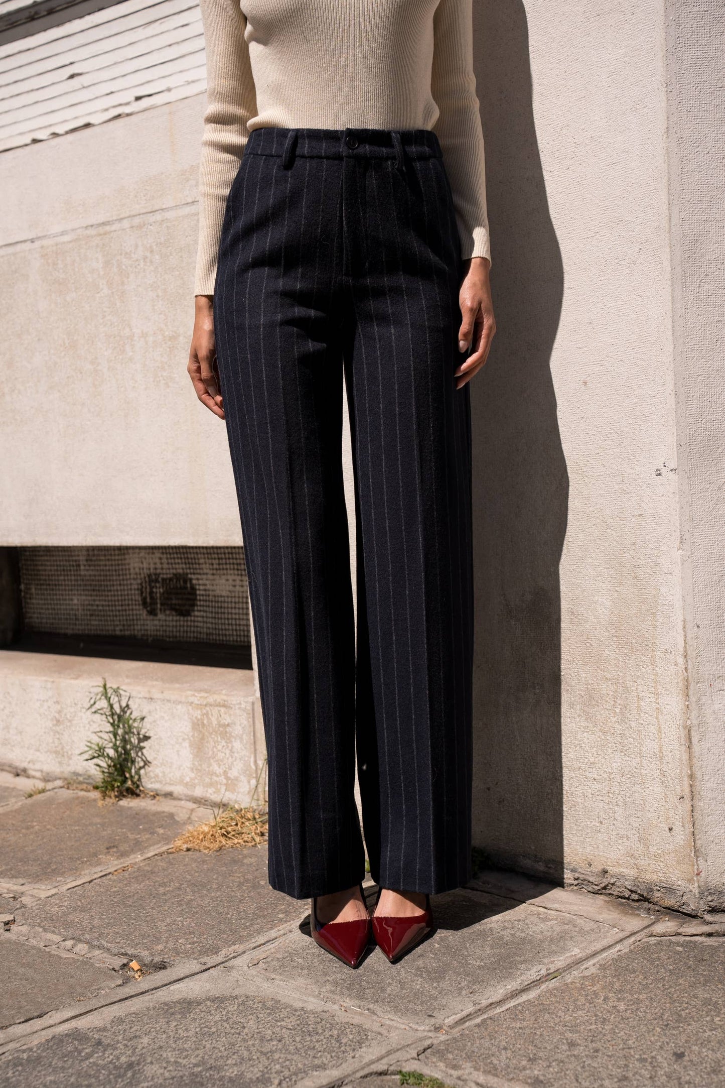 Pinstripe wool-blend trousers