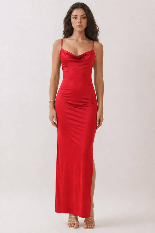 Woman wearing a red dress on a white background